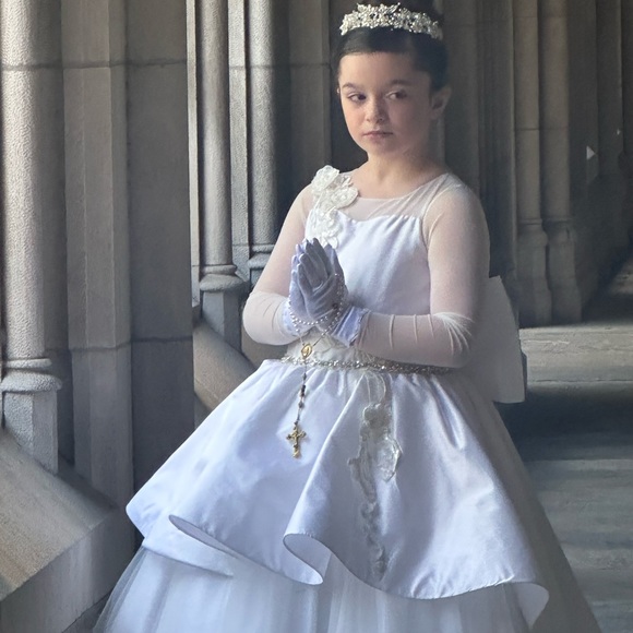 Communion dresses.Each $200.